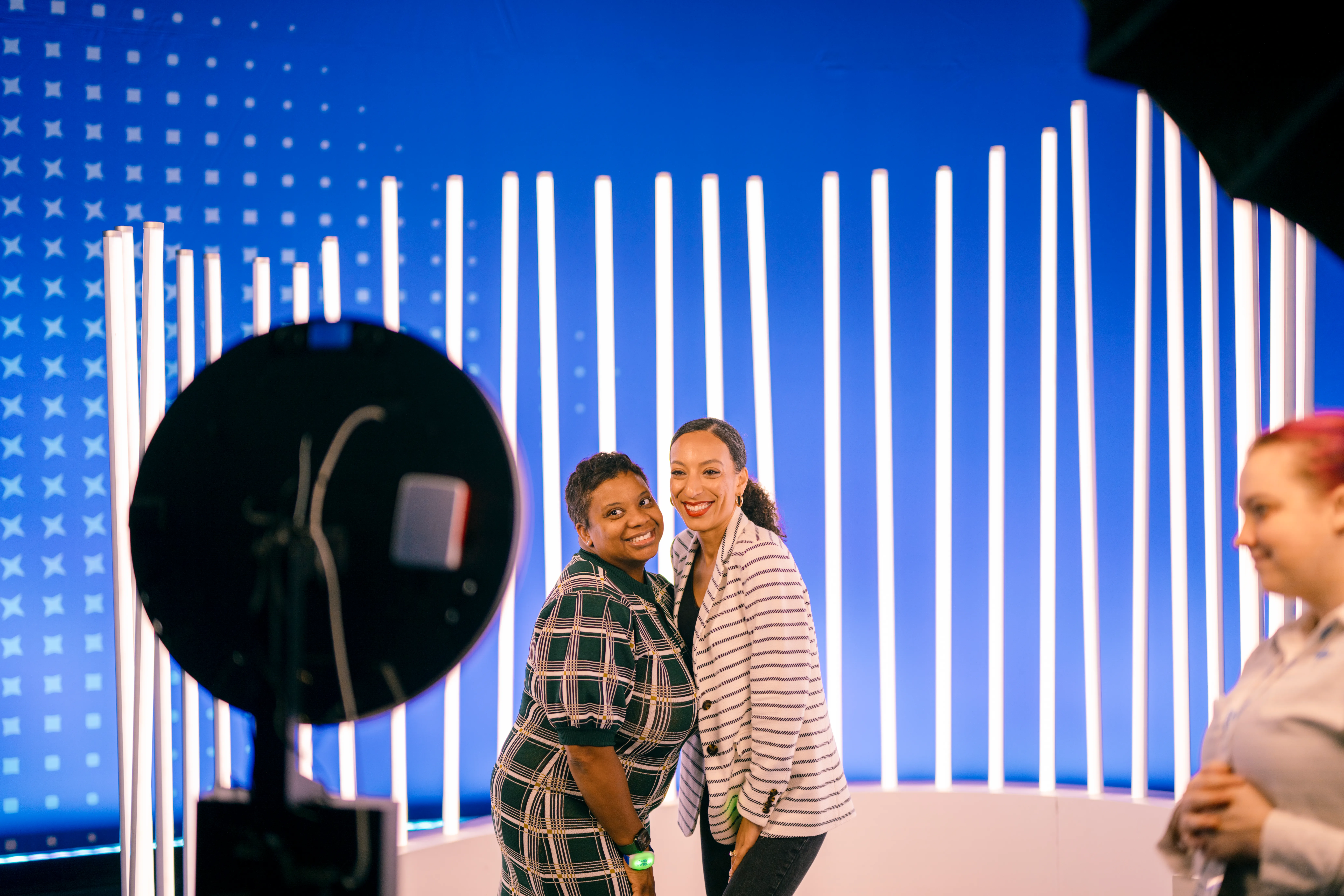 Attendees posing at the Ecolab 100 celebration photo booth